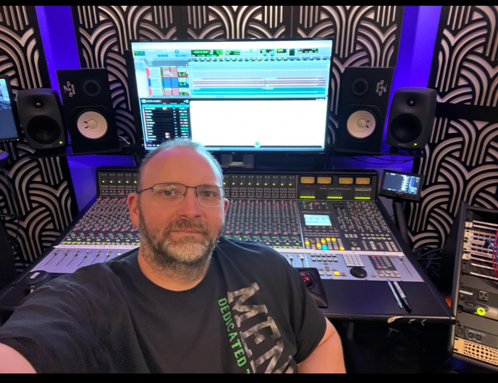 Tom Pisani at the console in the Vibe Vault Studios control room